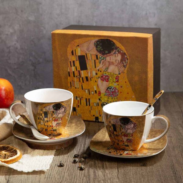 Tea cups set from The Kiss series on a gold background