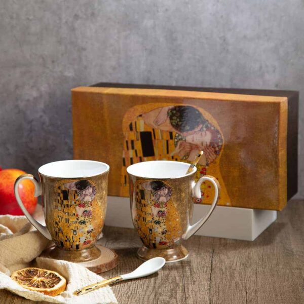 Set of tea cups from the Kiss series on a golden background