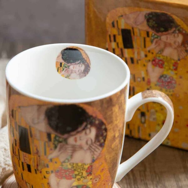 Gift cup from The Kiss series on a gold background