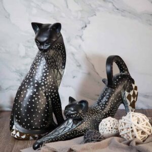 Cat statuette with white dots