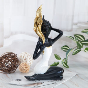 Decorative statuette with gold detail
