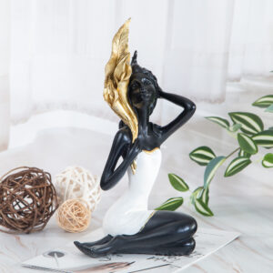 Decorative statuette with gold detail