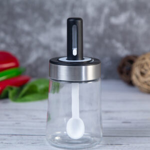 Spice jar with built-in spoon